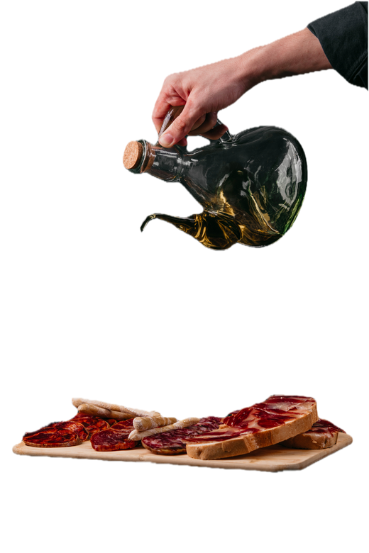 Mano ofreciendo jamón ibérico